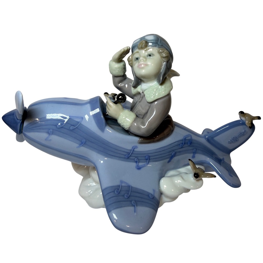 Lladro Up and Away 5767 Porcelain Figurine Boy Pilot Airplane Music Notes 1989